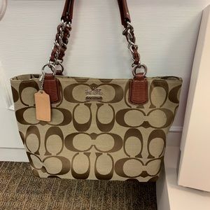 Coach Purse hardly used and In great condition.